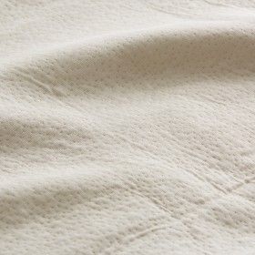 Colcha tejida + funda cojín Rice lino detalle