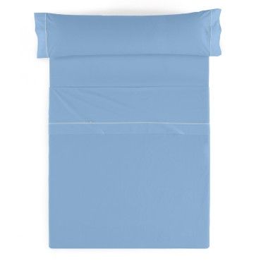 Juego de sábanas liso azul claro vista cenital