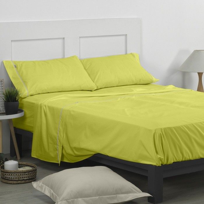 Juego de sábanas liso pistacho escena de cama