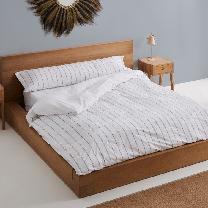 Dúo funda nórdica + almohada Rita azul escena de cama