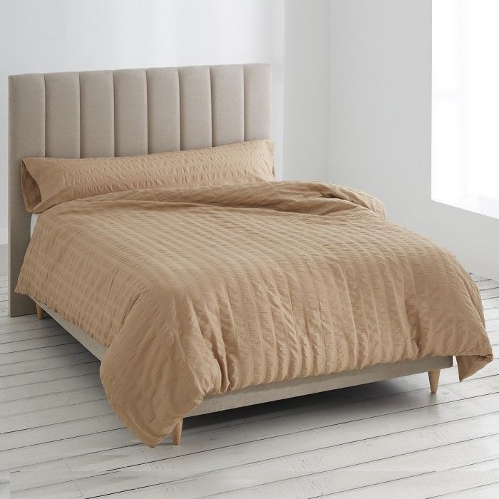 Dúo funda nórdica + almohada aman arena escena de cama