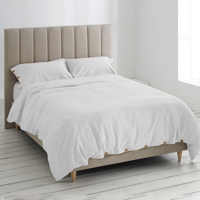 Dúo funda nórdica + almohada con botones suiza blanco escena cama