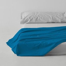Sábana encimera algodón poliéster azul escena de cama