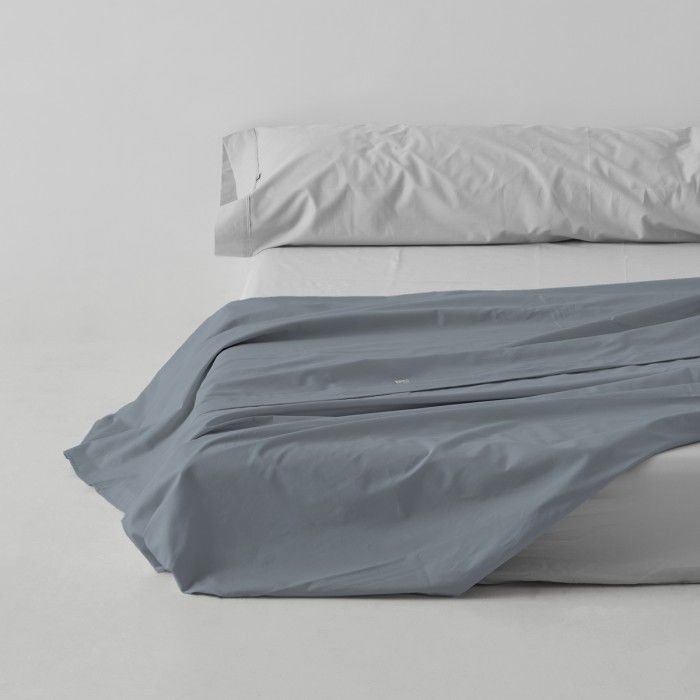 Sábana encimera algodón acero escena de cama