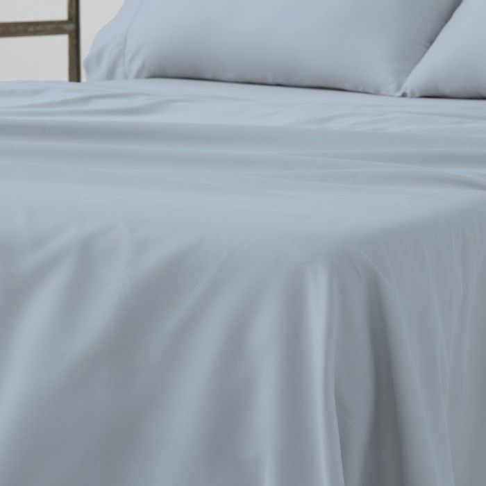 Juego de sábanas de algodón orgánico con doble pespunte color cielo - Qutun - Detalle encimera