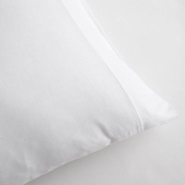 Funda almohada blanco detalle
