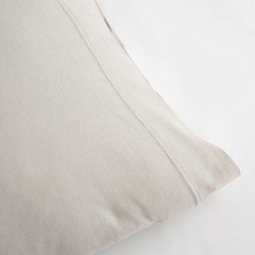 Funda almohada jersey piedra detalle