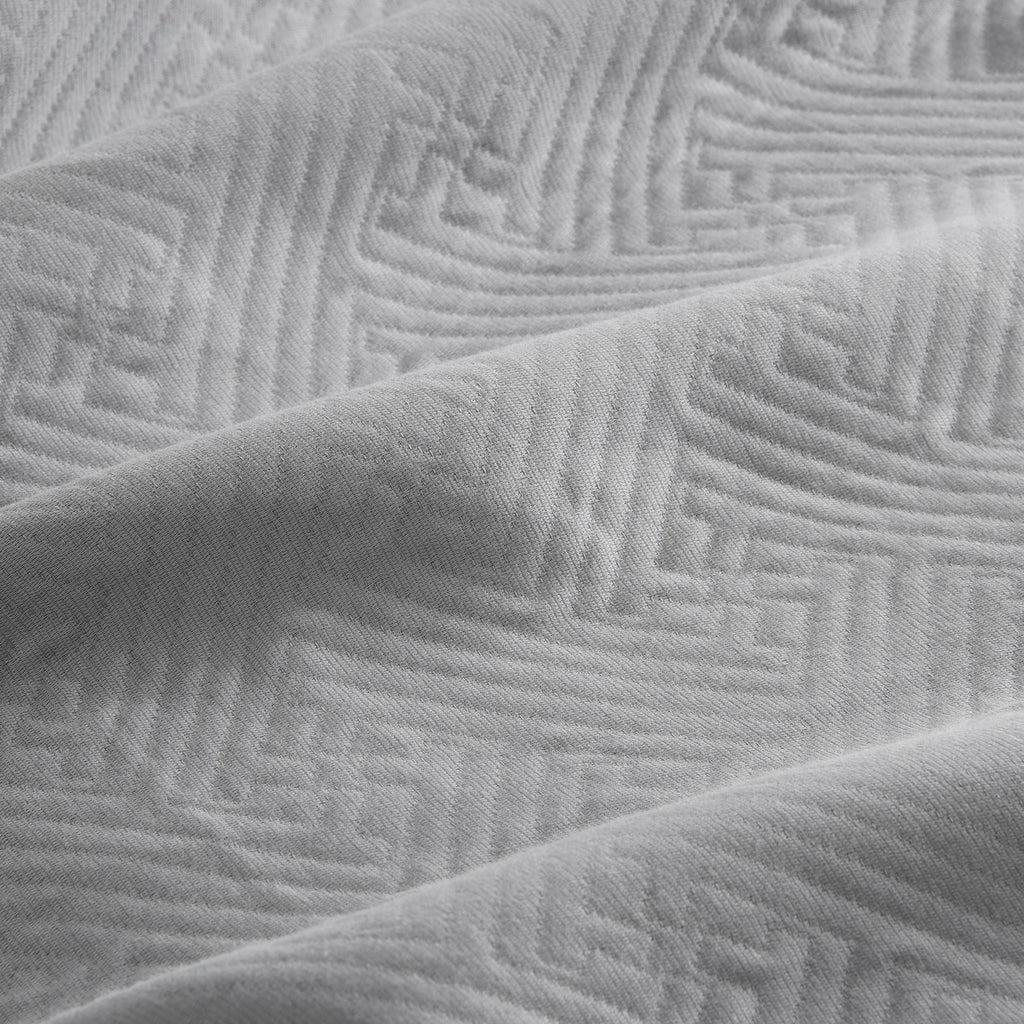 Colcha tejida + funda cojín Lines perla detalle