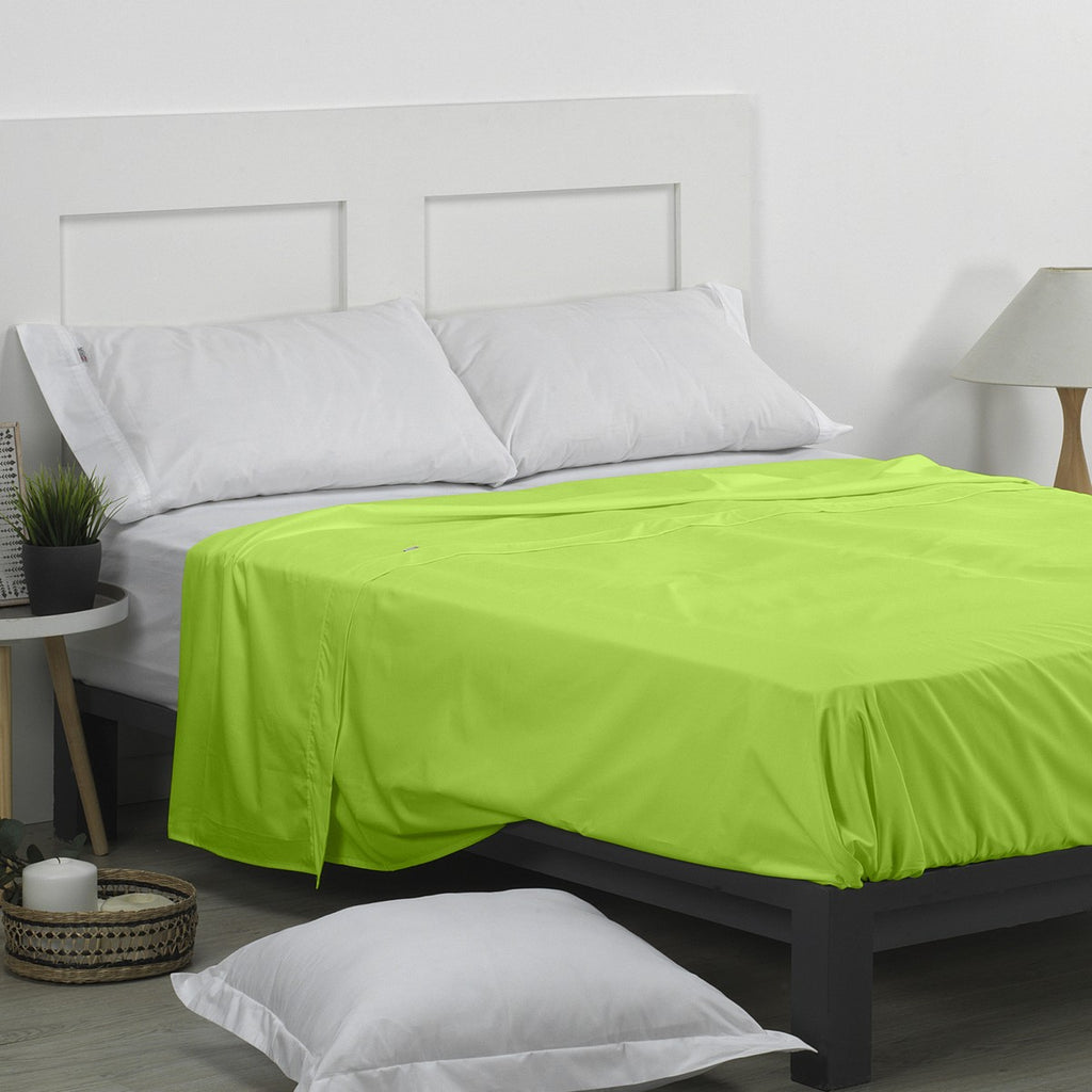 Sábana encimera 50/50 kiwi escena de cama