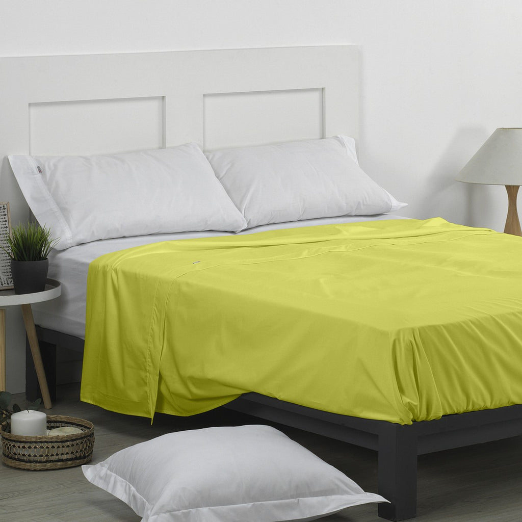 Sábana encimera 50/50 pistacho escena de cama