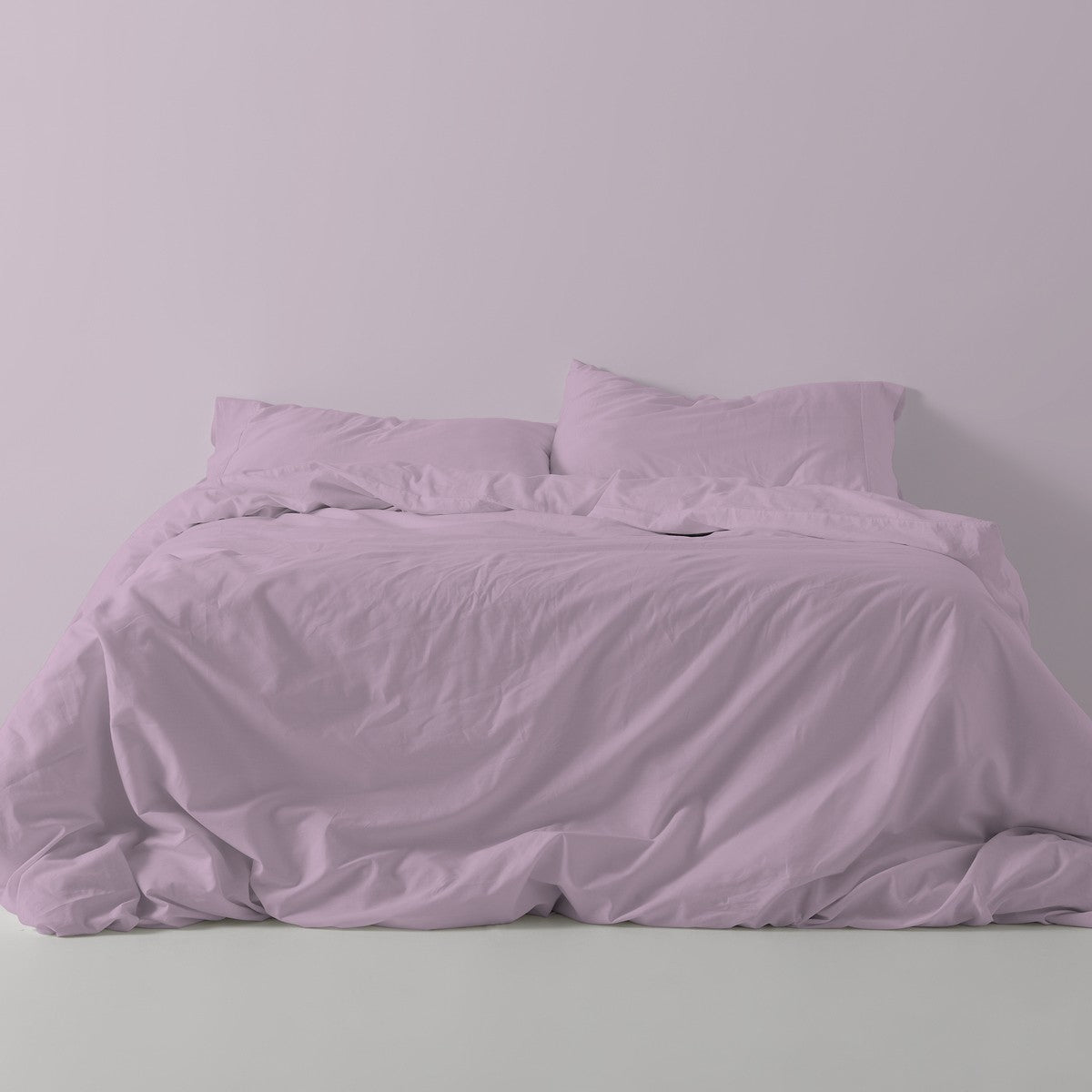 Funda nórdica lisa algodón malva escena de cama