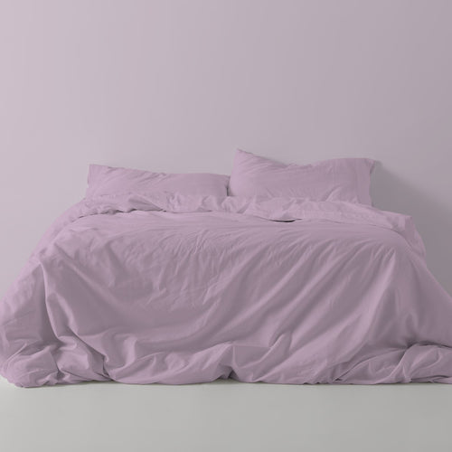 Funda nórdica lisa algodón malva escena de cama
